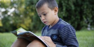 Child reading a magazine