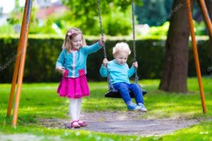 Children swinging 