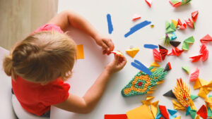 Child making origami